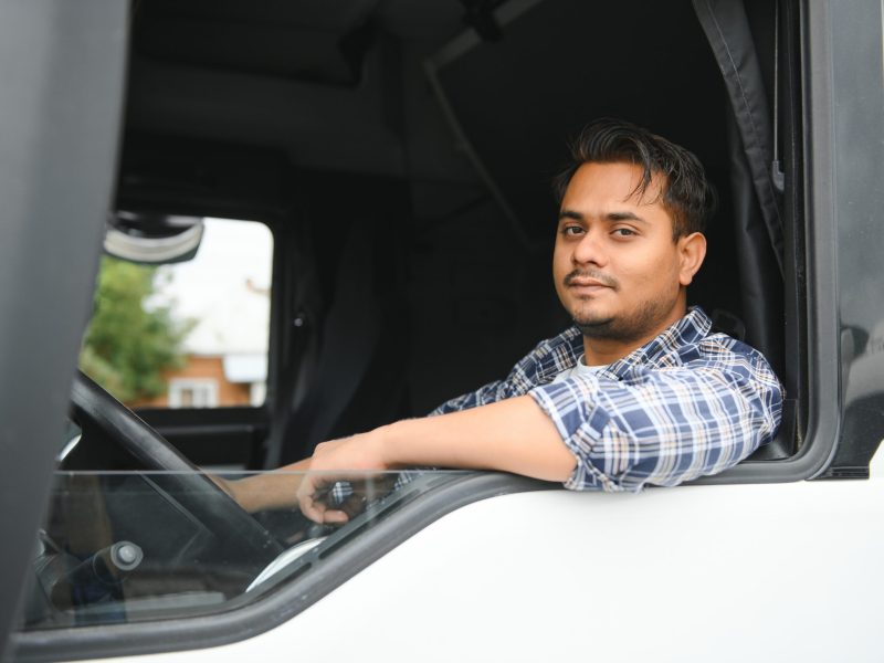 Portrait of a indian truck driver.